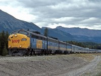 FP7A, VIA 6553 departs lake Louise with the westbound Canadian. A scene not to be repeated today, not only is the power different and the consist now all stainless steel but in 1990 the Canadian was rescheduled to CN's more northerly route through Edmonton and Jasper.