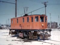 Prolific railway enthusiast Al Chione has provided us this duplicate image of NS&T Sweeper #23, circa 1955.  The town name was not identified on the slide, but the location is remarkably unchanged nearly 70 years later.  The NS&T had a Wye connection to the Canada Cement Spur (west side of Elm) and the catenary can be clearly seen in the image.  #23 is parked on the south side of the Wye, a location where she often resided.  Behind the unit is the Lion's Field Ball Diamond, one of the few such parks that enjoyed lights in the mid-50's.  Beyond that, the large home that can be seen, still stands but a modern apartment building was built around the property perimeter (Elm and Killaly Street), so the house is less pronounced now.... the great Detroit Rocker Bob Seger would likely characterize this scene today as "Still the Same"...minus the track and associated catenary of course.  Thanks to Steve H for helping out with this and some other recent posts...  

