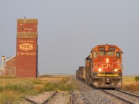 CN 5379 leads the nearly daily L556 turn out of Regina to Moosejaw passing one of the nicest Pool elevators in Saskatchewan