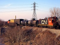 549 with CN SW1200RS 1346 heads over the CN Grimsby Sub on the Townline Spur heading Southbound towards Interlake Paper during 1997. This Spur has been removed.