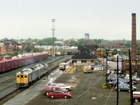 Via's Sudbury to White River RDC car train pulls up to the CP Sudbury station for fueling and passenger baggage loading