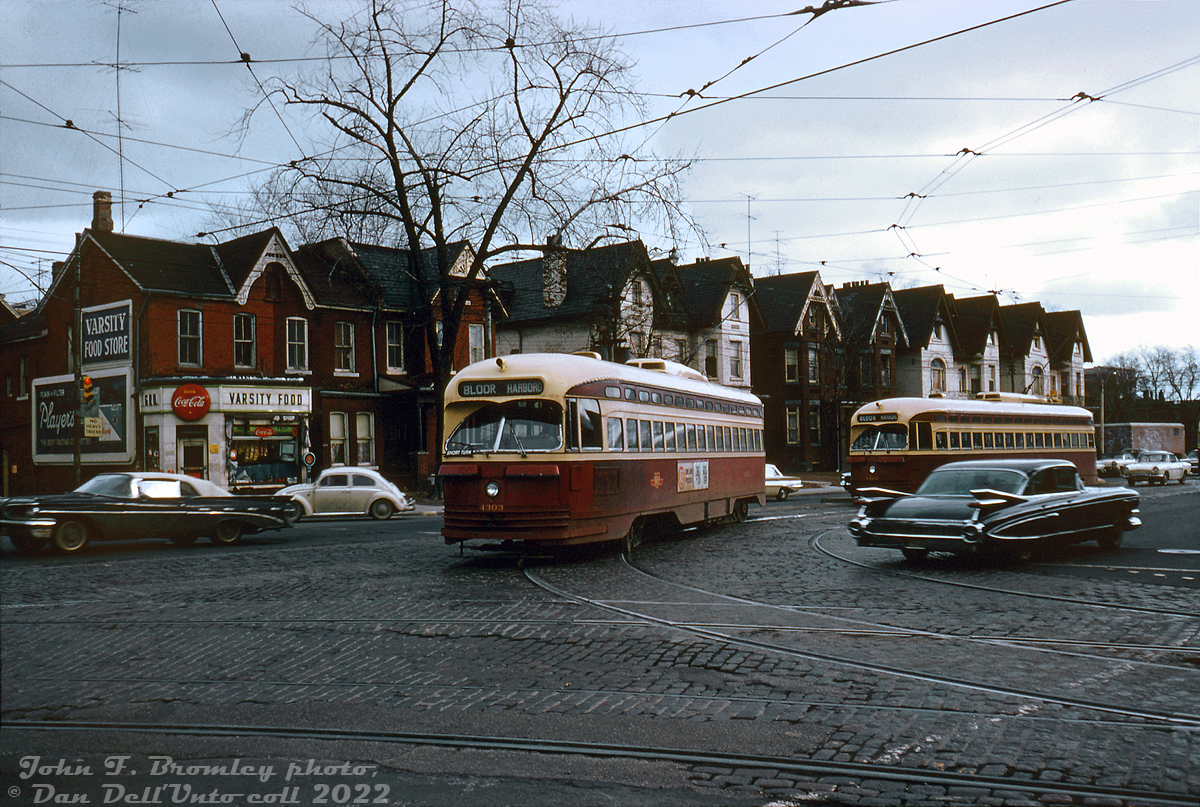 Operating on westbound Harbord run on a gloomy winter's day, TTC PCC 4303 (A6-class, built CC&F 1947) makes the turn from northbound Spadina Avenue to westbound Harbord Street. Car 4324 follows behind (seen later here detouring back eastbound via Bloor and down Spadina). The row of Victoria-era houses in the background would be gobbled up by the nearby University of Toronto's expanding St. George campus in the following years (no doubt "Varsity Food" is due to UofT's nearby proximity).The Harbord streetcar route would be discontinued a year later, its last day of service February 25th 1966, coinciding with the opening of the new crosstown Bloor-Danforth subway line the next day.John F. Bromley photo, Dan Dell'Unto collection slide.