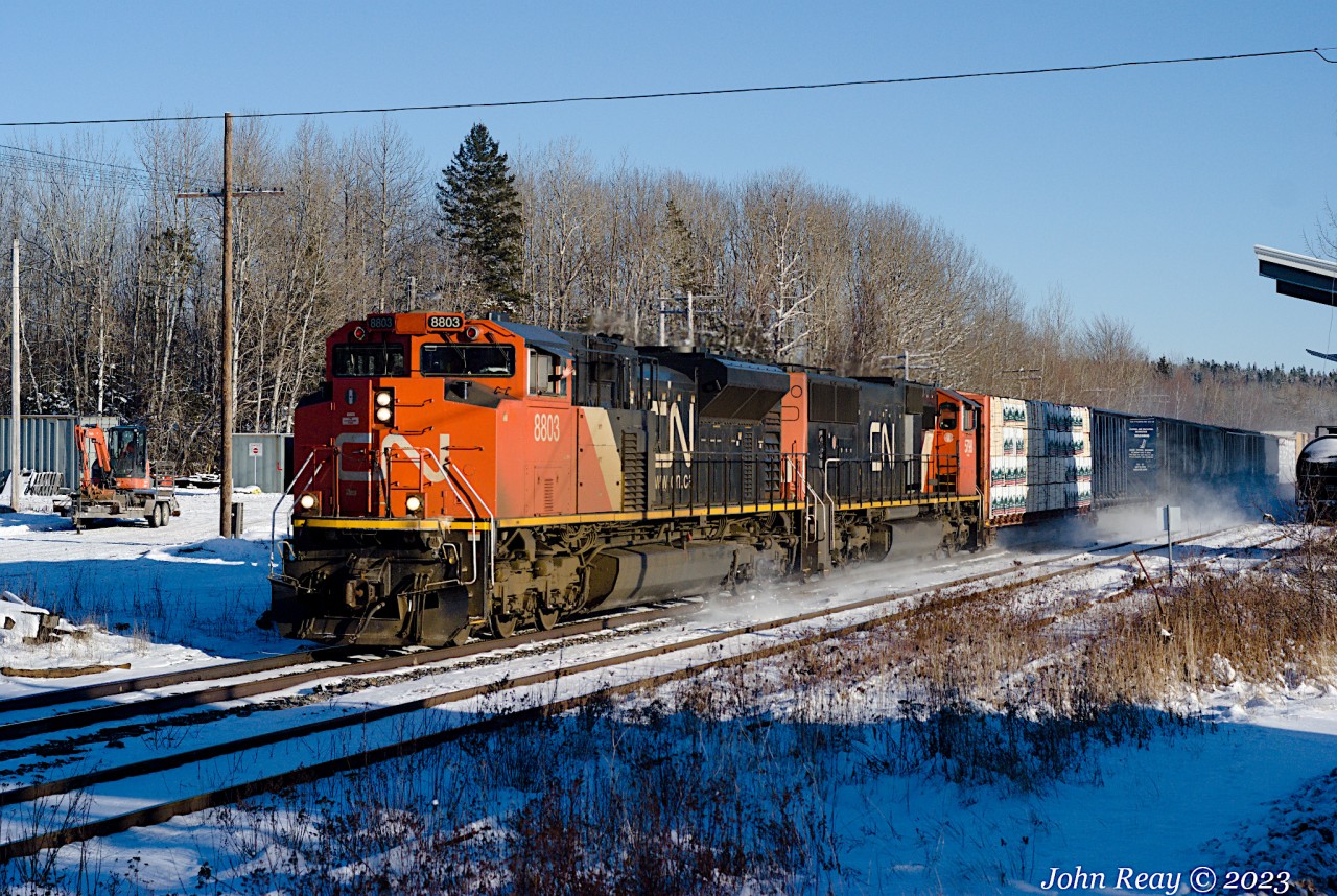 January 11th at 15:04, CN L507 by Oxford Junction NS (MP 46.9 CN Springhill sub), CN SD70M-2 8803 and CN SD75 5798, total axles 236. Note the friendly conductor's wave.