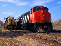 During the Fall of 1999 when Trillium Railway did their Interchange at Merritton TRRY 3575 lifts their cars and get ready to head southbound up the Thorold Spur, as PCHR 308 waited for them to clear so they can head back over the north side. 