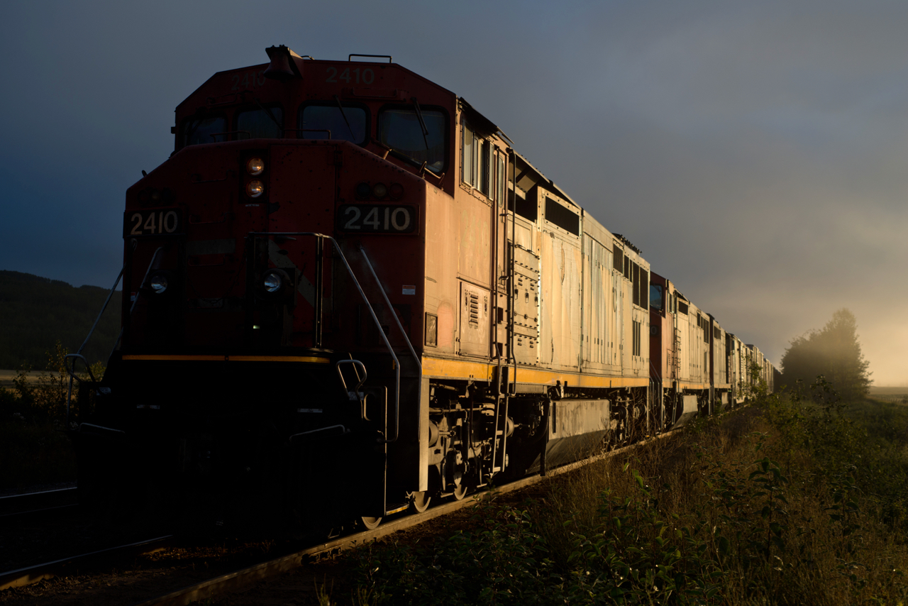 Working the 0400 Chetwynd roadswitcher normally meant a serious lack of sleep on my part, however there were some great photo opportunities that came along with the long days. Here, Dawson Creek bound train 579 with its three 2400s awaits a crew as the rising sun breaks through the low clouds at the north end of Chetwynd yard.