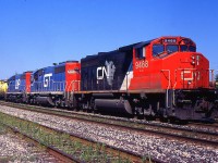 335 had great lashup with CN GP40-2(w) 9468, GTW SD40-2 5933, and DWP SD40-2 5908 through Merritton on the CN Grimsby Sub back in 1996.