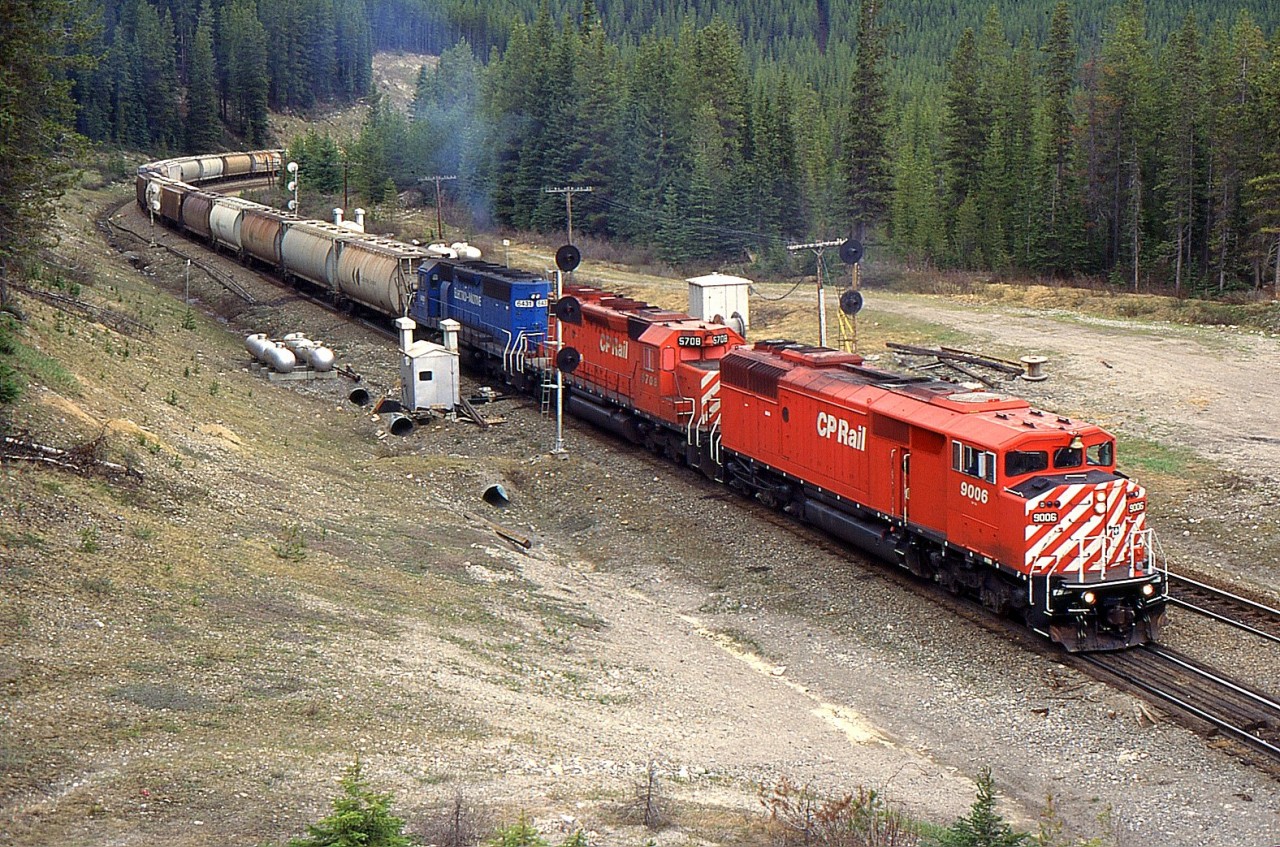 A CP SD40-2F 9006, CP SD40-2 5708 and EMD SD40-2 6431 at Catherdral in 1997.