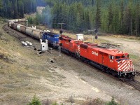 A CP SD40-2F 9006, CP SD40-2 5708 and EMD SD40-2 6431 at Catherdral in 1997.