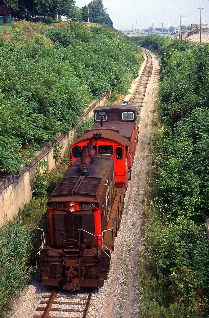 549 with CN SW1200RS 1389 and CN Van heading up the CN Thorold Sub, then they will back down the CN Fonthill Spur to do General Chemical.