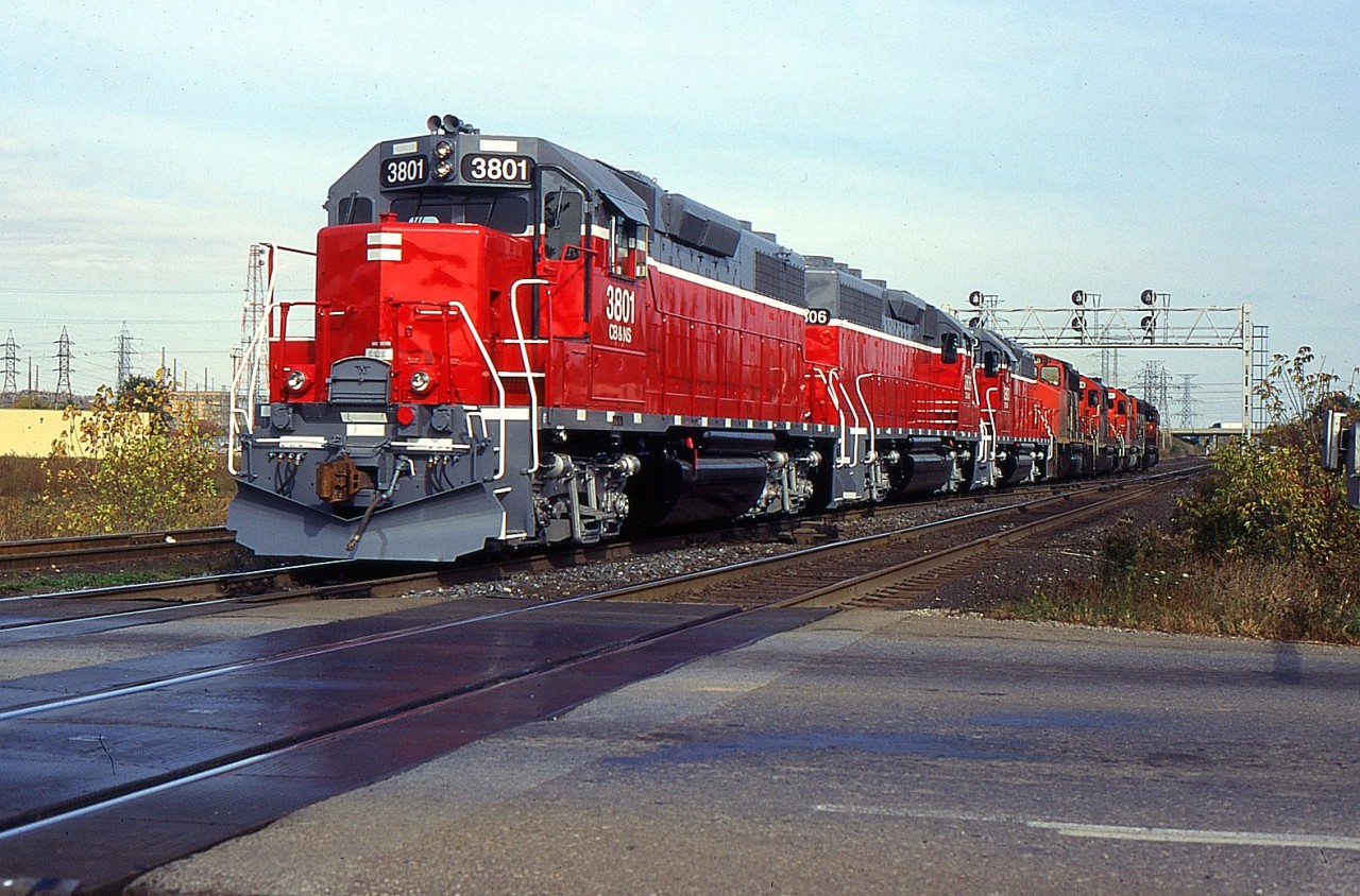 CN Eastbound at Aldershot East with three Rebuilt GP40-2s for CBNS on delivery in 1997.