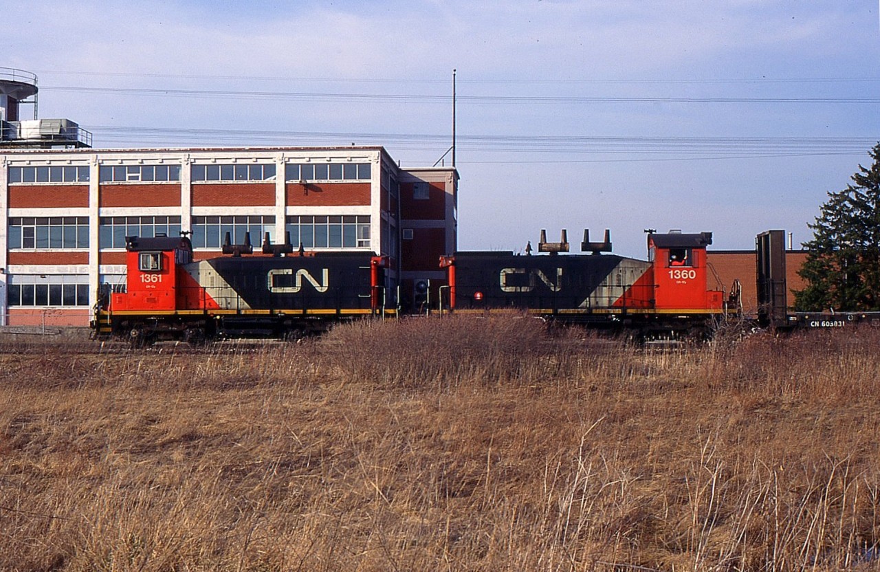 CN 549 with CN SW1200RS 1361 and CN SW1200RS 1360 head east after switching at Stark Lumber returning back to Merritton.
