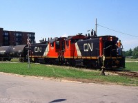 CN 549 with CN SW1200RS 1385 and CN SW1200RS 1388 returning back from General Chemical on the CN Fonthill Spur behind the Beer Store.