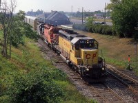 NS 287 with CP SD40-2 5424, CP SD40-2 5529, and NS SD40-2 6098 passed through St. Catharines in 1998.