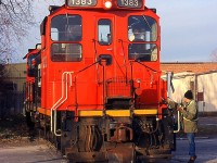 549 with CN 1383 leading as they are switching at Welland Ave in St. Catharines in 1998. This now is GIO Railways.