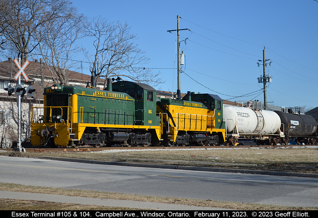 Essex Terminal's Heritage Unit #105 approaches Campbell Ave., as it leads sister #104, in it's new paint, on the 0830 job as they trundle along through the west end of Windsor heading to Ojibway Yard.  105 and 104 had left Lincoln Yard with the 2 tanks and made a pretty descent sized lift from the CN, including a couple autoracks which are becoming a more and more common site on the Essex Terminal with the new auto loading facility opening just off Kildare Road.