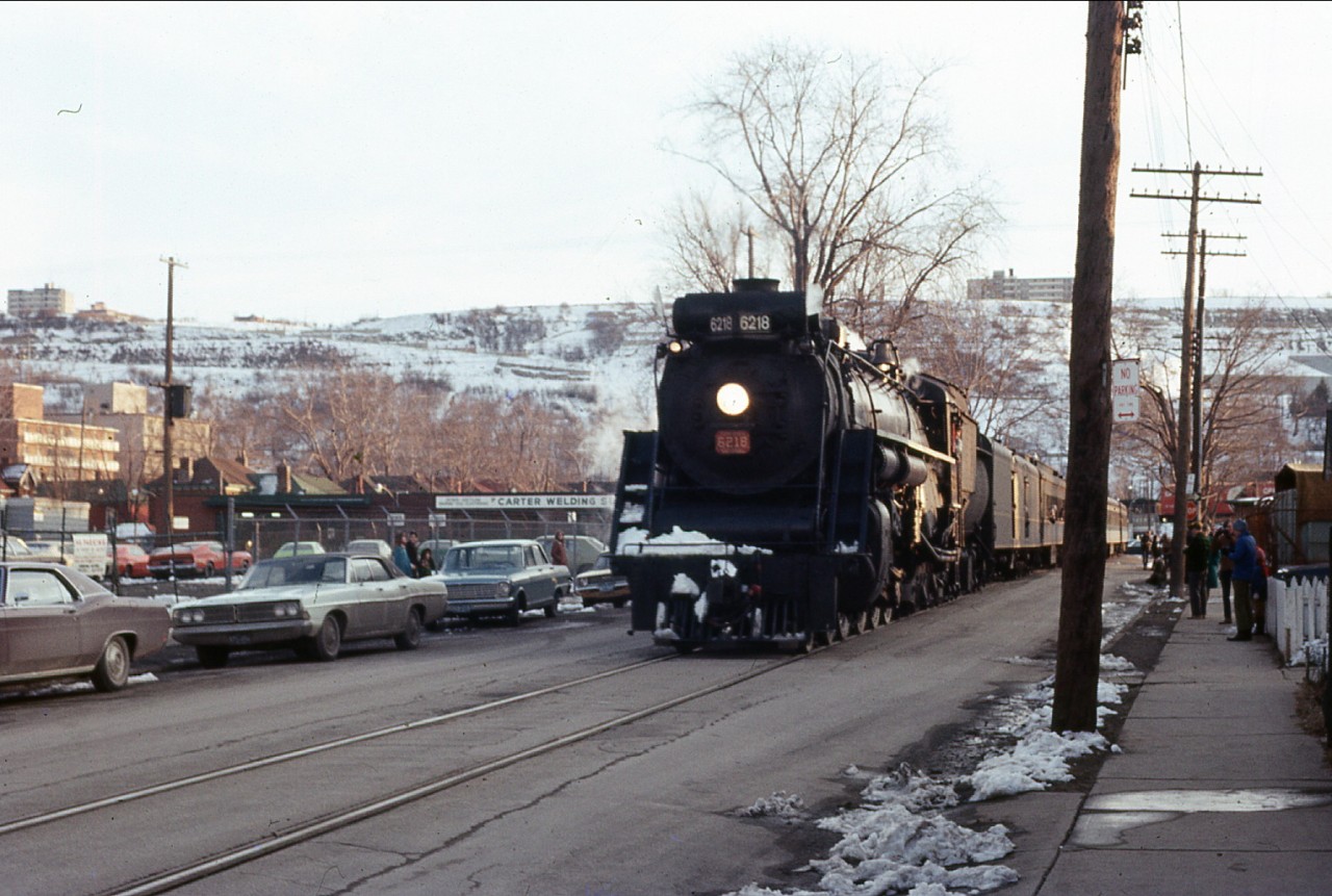 6218 on an excursion run heading down Ferguson Ave in Hamilton on a cool day March 21 1971 headed for the Hamilton GT station. Taken from the Peter Lokun collection.