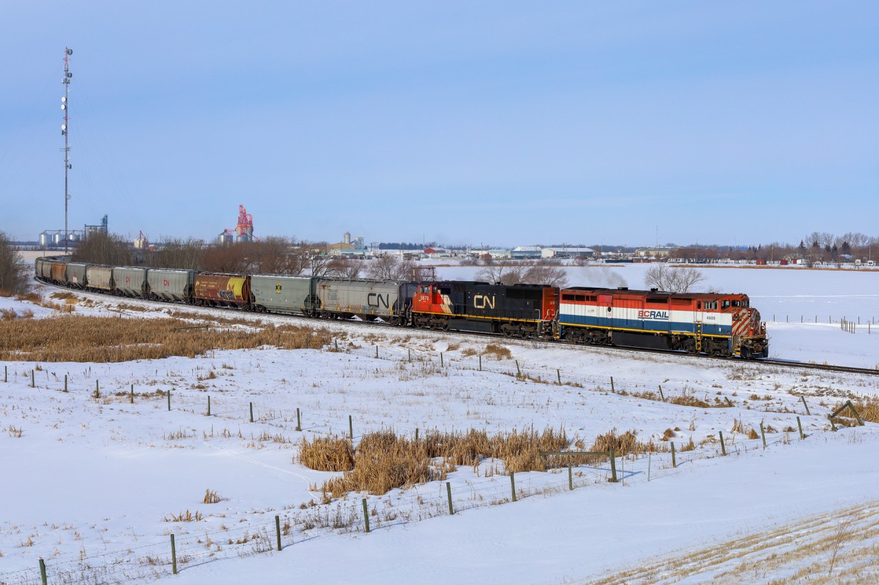 The last remaining cowl unit in service on CN, rolls into Morinville, Alberta on A 41851 21.