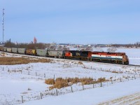 The last remaining cowl unit in service on CN, rolls into Morinville, Alberta on A 41851 21.