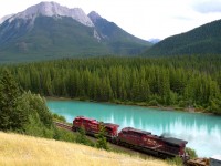 CP 8629 and CP 9567 heading towards Banff along the Bow River as it passes the Backswamp Viewpoint, Bow Valley Parkway, Alberta.