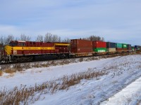 The Wisconsin Central Heritage unit leads Q 18331 26 through Lindbrook, Alberta