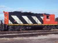 Mac Yard.  I always considered this to be in the community of Concord. Now I wonder if Concord even exists any more. Early in this railroad photography hobby my favourite locomotive was the GP9. I liked its clean lines, and how reliable they seemed to be. Made for great lashups out of Fort Erie, where a good number of them were based. This "roster" shot of CN 4586 worked out just right for me on a visit to Mac Yards many years ago, and although it isn't in the solid black scheme I liked, it is still a great example of what used to be.  The CN 4586 was rebuilt into 7218 back around 1993, and it eventually was retired in 2011. Sad that GP9s as I knew them are now gone. There used to be hundreds of them on the CN in the '70s.