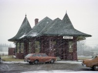 The old Whitby Junction station was built in 1903 at the foot of Byron St in town, roughly where the current GO platform is located.  Station closed in 1969 and fortunately was moved in 1970 to Victoria & Henry Streets, as pictured here. Later it was moved across the street to Iroquois Park. It has been expanded and upgraded; restored inside to perfection, one might say, as the Station (Art) Gallery. It is fitting that a structure as beautiful as this was saved. The image reminds me of the days when I would go anywhere in any weather to shoot a station photo........even over to the east side of (ugh) Toronto !!