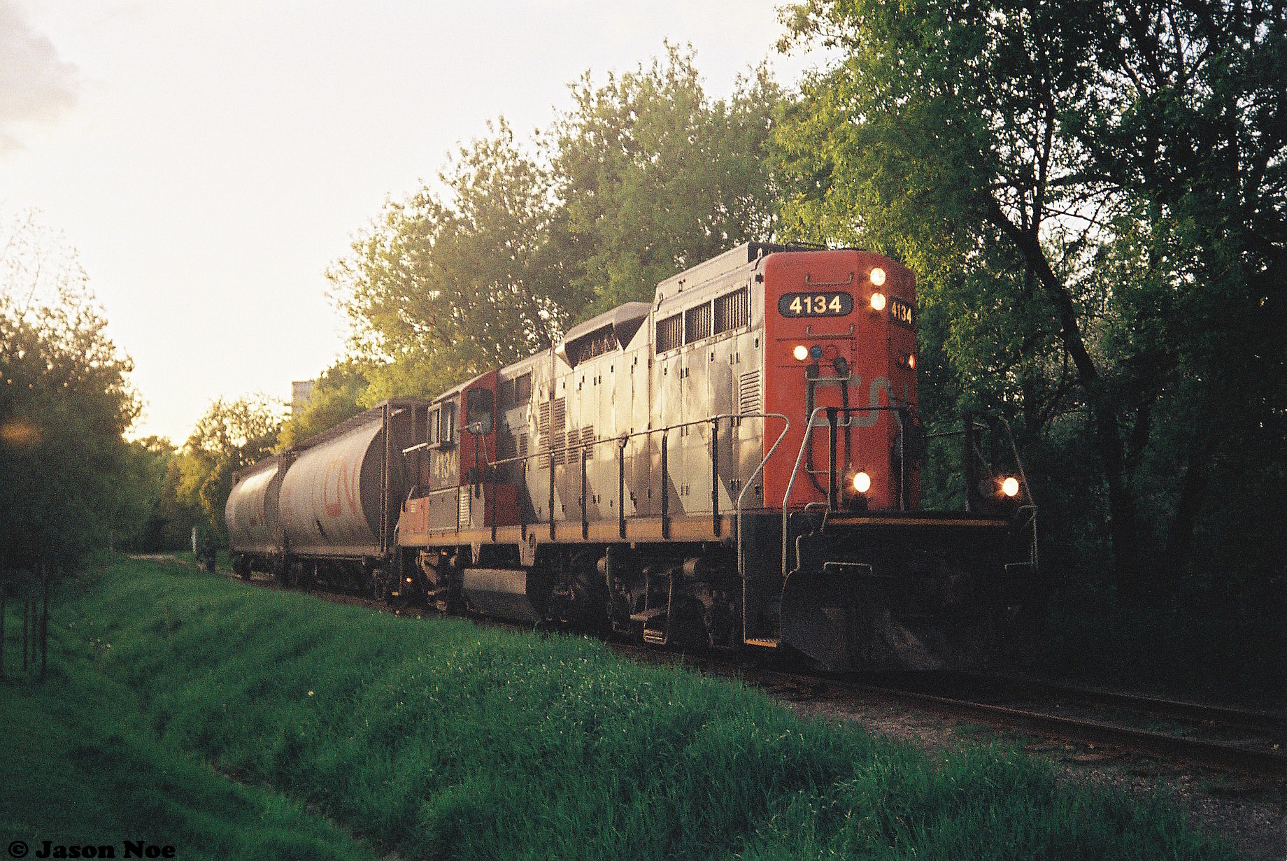 Railpictures.ca Jason Noe Photo The sun is just dipping below the