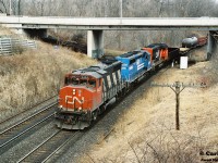 CN GP40-2L(W) 9457, Conrail SD40-2 6484 and another GP40-2L(W) in CNNA paint power a westbound through Bayview Junction, bound for either the Dundas or Grimsby Subdivision.