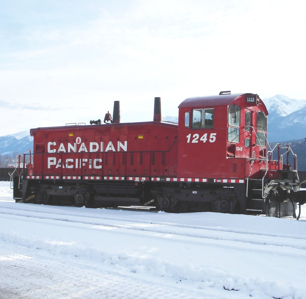 CP 1245 sits in the yard just west of CP's Golden car shop on a very pleasant February 18, 2009.

Retired by CP on March 28, 2012, three years after this photo was taken, it was sold to Ontario Southland Railway on October 20th that same year.

This unit was built new by GMD in 1960 with serial number A 1909 as CP 8163, Class DS-12. It was then rebuilt by CP in 1982 as SW1200RSu and renumbered to CP 1245.

At 63 years old it continues to earn its keep on the OSR in 2023.