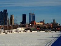 CN 5650 & CN 2520 are leading a late CN 430 over the snow-covered Lachine Canal on a very cold morning. The power had come to Montreal on grain train CN 846 from Michigan.