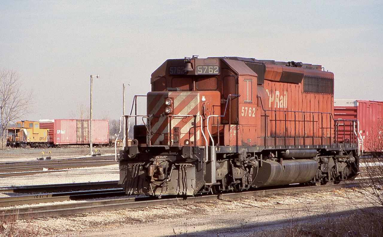 I never really understood why a railroad would take a perfectly usable unit and turn it into a “B” unit, but maybe there is more to the story than what I know. I understand the former NS units as they were not Canadian approved leaders and had high short hoods but these units were originally standard “A” units. Thus day in Welland I finally was able to shoot one that was not nose coupled so I took the opportunity. Note the missing ditch lights and blanked out windows. That summer I even found a fully “beaver” painted one out west. They were neat units nonetheless.