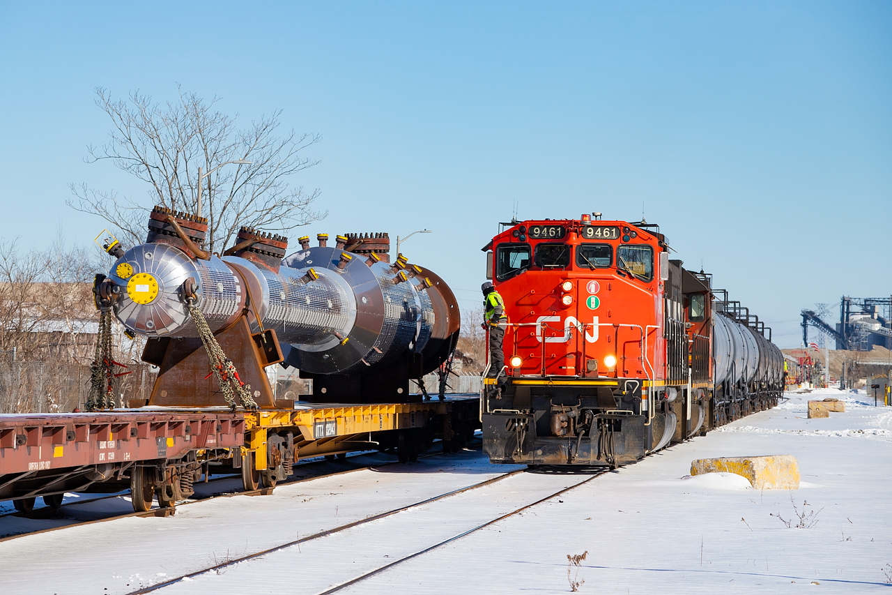 The CN 0700 Yard Job is shoving towards Parkland Fuels as they pass by an impressive dimensional load from Hooper Welding. This is the second such load I have seen in the last two months, with the other here. Even the crew members seemed impressed by this one.