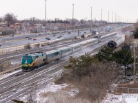 Holi-delays...
Many are familiar with the massive VIA delays that occurred over the weekend before Christmas. Over a dozen VIA trains incurred delays above 3 hours on the CN Kingston sub and 5 trains were left out in the cold overnight. VIA 55, VIA 69, VIA 669, VIA 48, and VIA 54. VIA 55 was the train hit by a tree and VIA 69 and VIA 669 crawled into Cobourg overnight behind it. The decision was made to combine 69 & 669 there, making for an extremely rare westbound "J-Train". After departing Oshawa, VIA 69/669 is on the home stretch to Toronto with 669 being 15 ½ hours late and VIA 69 nearly 17 hours late. I really feel for everyone involved with those trains, and figured the high vantage point would be nice to document the occurrence. 