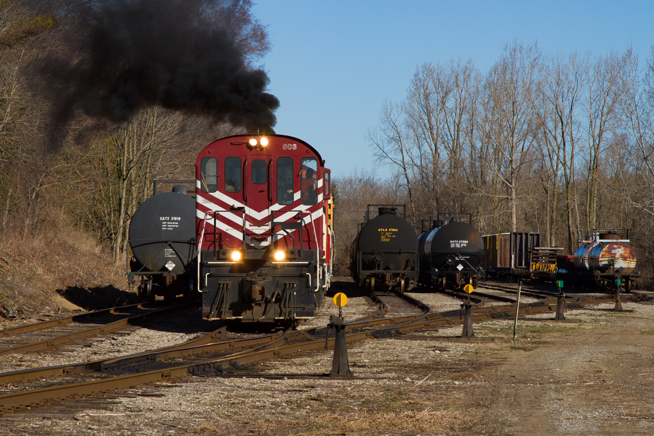 On a gorgeous April morning, (at the time) recently re-activated RS23 503 is back doing her thing, as they drill cars in Tillsonburg after making the trip down from Salford earlier. The hogger gives a nice touch of the throttle as they shove a cut, releasing the notorious MLW/ALCO smoke that we all love. Great crew and a great chase, although it wasn't long before the clouds rolled in. Glad I got the best of the morning light at least.
Recently, this unit has been sidelined once again after a few weeks/months back on the road last year. Currently the only MLW in active service on the OSR is RS18, 182. Better than nothing, but never take advantage of these old girls. Never know when you'll have your last shot.