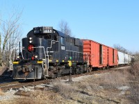 With a Saturday agenda that didn't include photographing Trillium Railway, we were surprised when we arrived at Feeder and found no locomotives parked.  We had seen JLCX 3502 switching the east end of WH Yard, but expected to find TRRY 1859 and LDSX 8920 at Feeder.  We opted for a wild goose chase north to St. Catharines hoping to come across something and luckily, upon arrival at Merriton, TRRY 1859 and train were just getting on to the CN.  They had lifted two empty boxcars from WP Warehousing and six new NS coil cars from Steelcon (formerly Trenergy Inc.?), where the coil covers are fabricated and installed.  We followed the train back south, where they would lift more completed steel coil cars from a siding in Welland.  At WH Yard, where this photo was taken, they had to sort out hoppers from the south siding before calling it a day.  The old MLW sounded great sorting the cars.  It got me thinking: Is TRRY 1859 the last regularly-operated MLW in Ontario?  TRRY 108 was parked at the former Martech site, and OSR still has some RS-23 and RS-18u, but they aren't regularly used.      