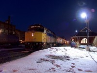 Almost 18 years ago, VIA 87 makes its station stop at Kitchener on a cold March evening.