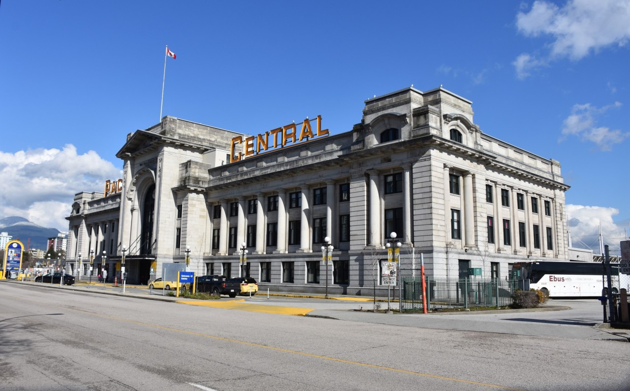 Recently back from another cross-Canada and return trip on VIA 001 & 002 The Canadian (January 25-February 3). Only had about 6-8 hours of sunshine on the whole journey. Not a lot of well-lit photos to post. So, I'm reaching back to March of 2020 for this clear sky and sunshine photo of VIA's Pacific Central station in Vancouver, BC. I would be boarding VIA 002 in a few short hours on what would turn out to be one of the last, if not the last departing cross-country trip for The Canadian for quite some time to come. I arrived in Toronto on March 10, 2020, and Covid lockdowns began a few days later.
For such an imposing exterior presence, this impressive looking structure has a very small main hall, with an equally small waiting room and check-in area. The bulk of the buildings main floor is office and commercial space to either side of the front center entrance.