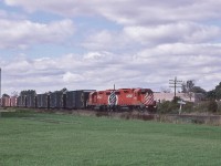 <br>
<br>
Good looking pair....
<br>
<br>
...Three years new, March 1983 built  GMD GP38-2  CP Rail #3021 & 3022 have the 'Schwa Turn in tow
<br>
<br>
at CP Rail Whitby, October 5, 1986 Kodachrome by S.Danko.
<br>
<br>
More 
<br>
<br>
     <a href="http://www.railpictures.ca/?attachment_id=  40133 ">  fresh quartette   </a>
<br>
<br>
sdfourty



