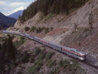 Following up on last week’s post showing VIA 2 on the CP Fraser River bridge near Cisco (http://www.railpictures.ca/?attachment_id=51394), here is the same train moments later on Saturday 1980-06-07, displaying a wide array of passenger equipment including RIDING MOUNTAIN PARK at the rear, and with the upgrade CP-to-CN connecting track visible above.