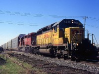 NS 287 with CP SD40-2 5430 and STL&H SD40-2 5615 passing through Mile 12 on the CN Grimsby Sub in 1998.