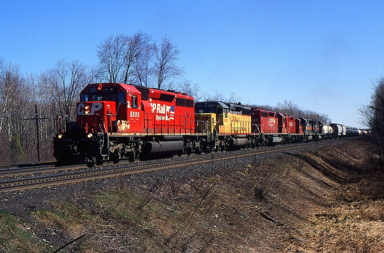 CP Westbound with CP 5595 leading through Guelph Jct East on the CP Galt Sub back in 1999.