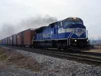 A CR SD80MAC 7216 leads NS 327 through St. Catharines on the CN Grimsby Sub these are rare to see up here in Southern Ontario.