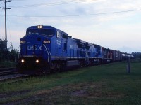 Manage to get ahead of 334 with LMSX 722 leading downbound on the Thorold Sub just before dark. This was a Reroute due to track work on the CN Stamford Sub between Robbins and Clifton. Trillium needed a pilot on board to guide CN on their trackage until they got to Merritton onto their own CN Grimsby Sub. Rare to see it back in 2000.