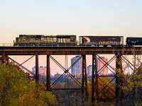 A shot that eventually grew on me was this darkened capture of CP 6644 leading 528. I wanted to experiment with this bridge on the Belleville Sub just east of Leaside, and a backlit leader presented the opportunity to shoot this from the side. Unfortunately, Toronto Yard experienced congestion on both tracks as multiple inbound trains fought to get into the yard and RTC would have to stop 528 in Leaside while things were getting sorted out. This delay was long enough for the sun to go down, taking away any direct sunlight, but the indirect sunset sky made for a nice backdrop behind this thing as it passed over.