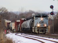 CP 2-230 clears Oshawa West moments after the crew finished dealing with a locked axle. I believe it was the 14th that began to smoke after departing Toronto Yard and set off the defect detector near Cherrywood, so they pulled into the siding at Whitby to take off the breaks on that axle before continuing business as usual. They managed to pick up some speed by the time they rounded the corner behind me with the assistance of UP 7975 which seemed to stalk 7023 around Canada for a couple weeks following this, as the pair were then rallied back and forth by Montreal and Edmonton on 118 and 119.