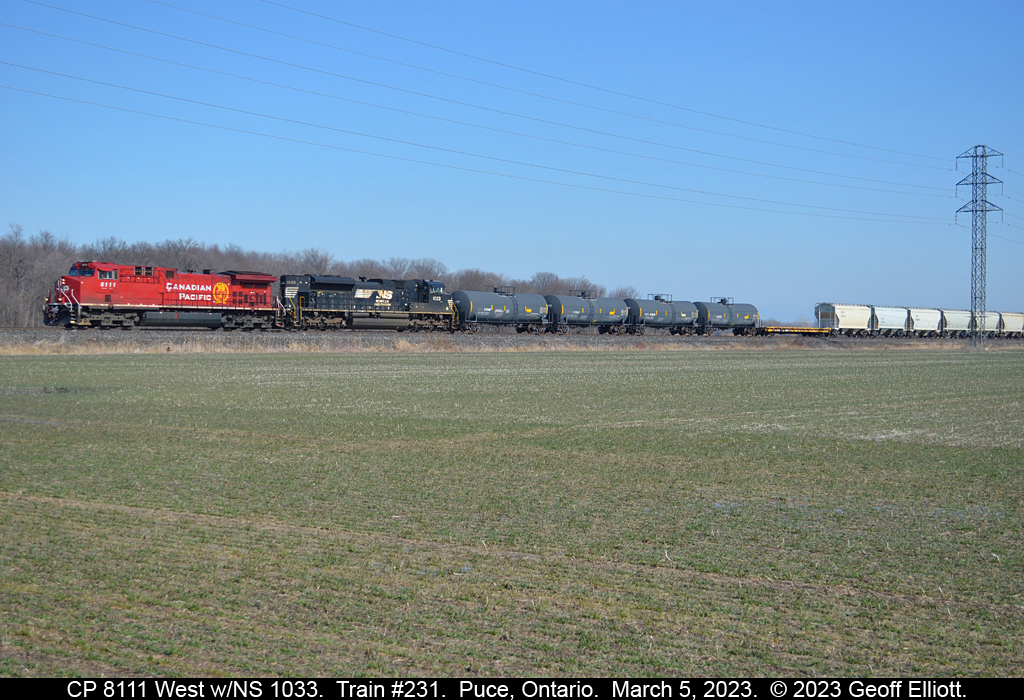 CP 8111 leads NS SD70ACe #1033 on CP train #231 as it rolls through Puce, Ontario on a beautiful March 5th of 2023...