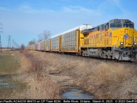 "Fresh Fish!!"  Union Pacific C44ACM #6473 sports a fresh coat of Armour Yellow with UP's most recent paint scheme as it is leads a relatively short CP Train #234 through Belle River, Ontario on March 8, 2023.