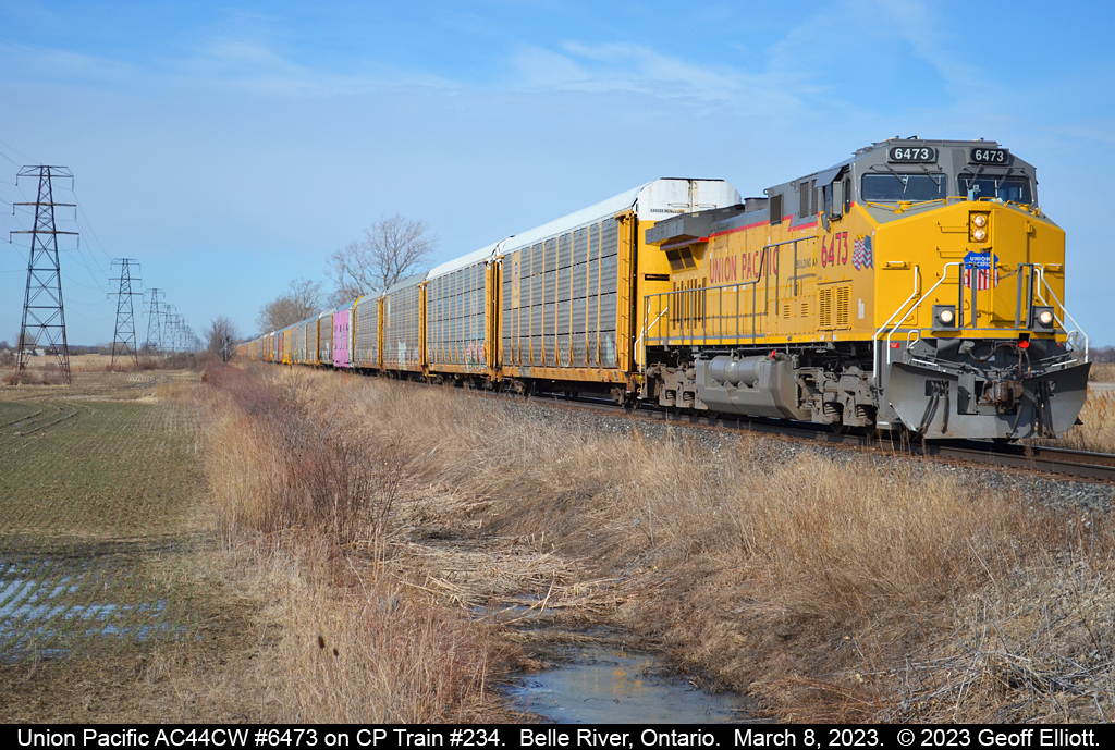 "Fresh Fish!!"  Union Pacific C44ACM #6473 sports a fresh coat of Armour Yellow with UP's most recent paint scheme as it is leads a relatively short CP Train #234 through Belle River, Ontario on March 8, 2023.