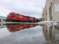 Over the last week or so, Toronto has enjoyed a stress-free guarantee to watch the last GP38-2 in dual flag livery operate on the 4-axle pair allocated to H22, H24, and H27 out of Lambton Yard. On Saturdays, the duo is taken on the latter to work on the Canpa Sub and in Area H. With CP 4404 facing north, overcast conditions were integral to prevent backlighting on the unit, and an erratic temperature hike typical of the GTA allowed for some puddles to facilitate a reflection shot or three as compensation for the grey scenery.