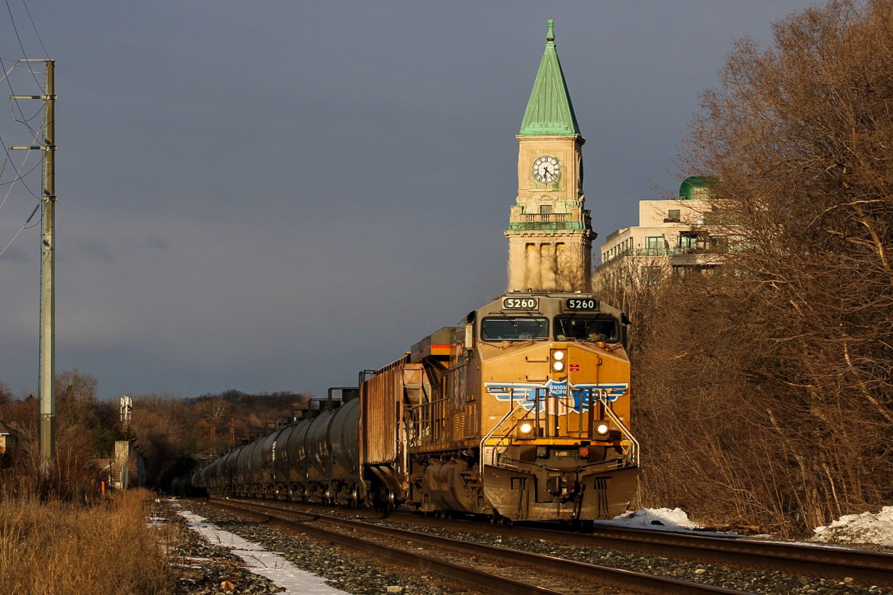 UP 5260 leads CP 529 past the historic Summerhill Clock Tower on the North Toronto Sub. When I had seen this train earlier in the day, the faded yellow was a little more apparent, so I was happy to see it in the golden hour where the parallels in light and the paint did it some justice.